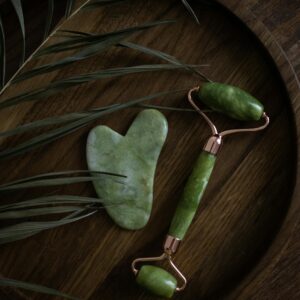 a jade roller and a guasha device belonging to Wendy, the founder of a company that embraces a customer first culture.